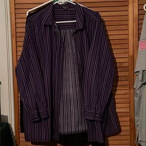 Roaman’s long-sleeved purple-striped blouse